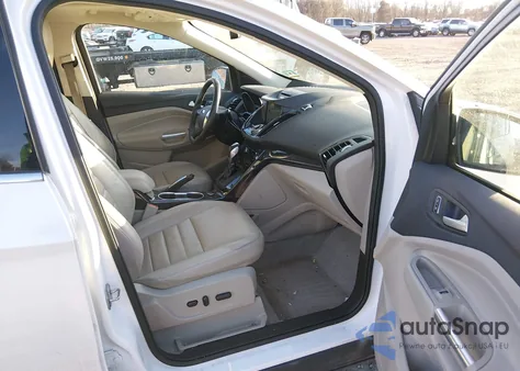 2016 Ford Escape Titanium z USA, uszkodzony, nr VIN 1FMCU9J90GUC72520